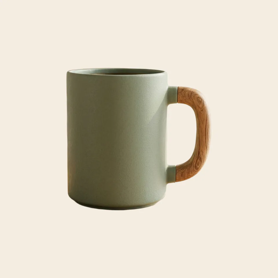 The cut-out mug on a plain cream background
