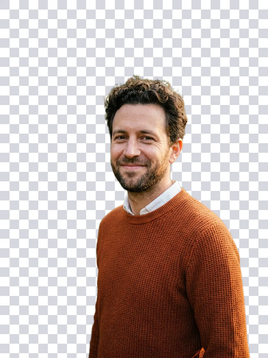 The same man cut out on a transparent background, shown as a gray checkerboard, with his curly hair intact